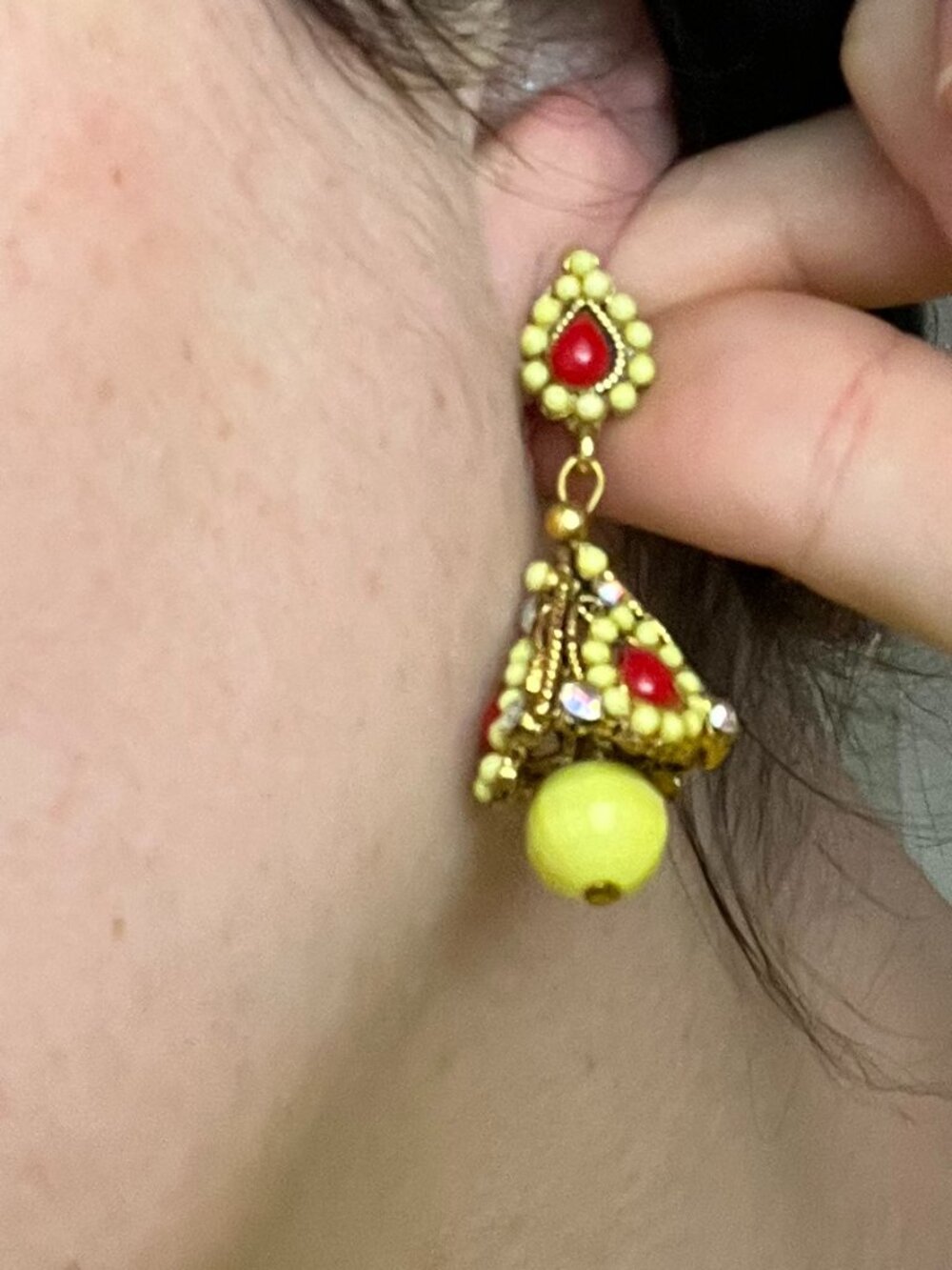 Yellow jhumka-style earrings